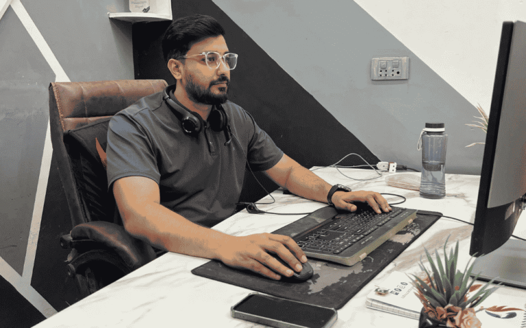 WDL team member working on a computer at the Johar Town office in Lahore