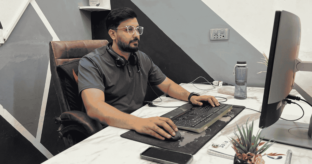 WDL team member working on a computer at the Johar Town office in Lahore